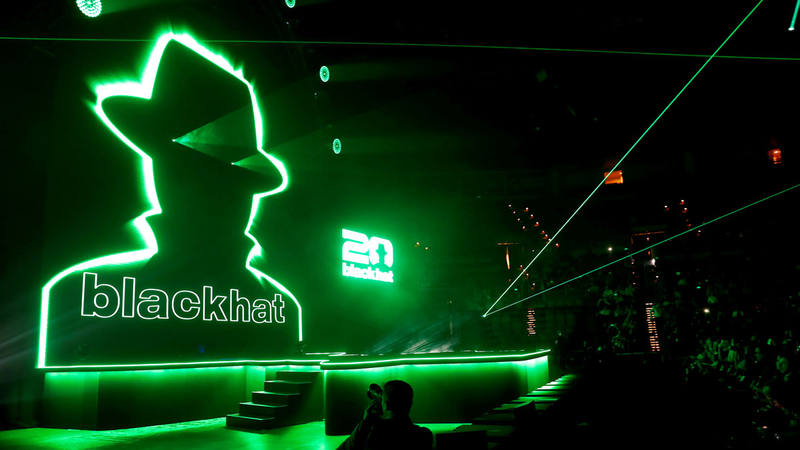 FILE PHOTO: The Black Hat logo is displayed before a keynote address during the Black Hat information security conference in Las Vegas
